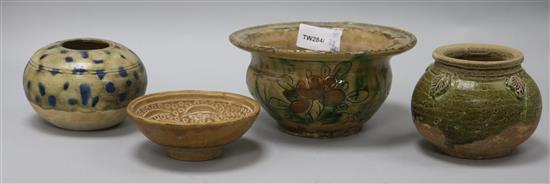 Four Chinese sancai and green glazed pottery vessels, Tang dynasty or later